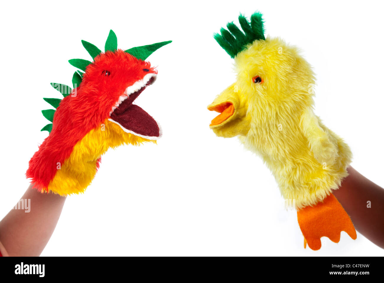 Crazy chick and lizard hand puppets Stock Photo