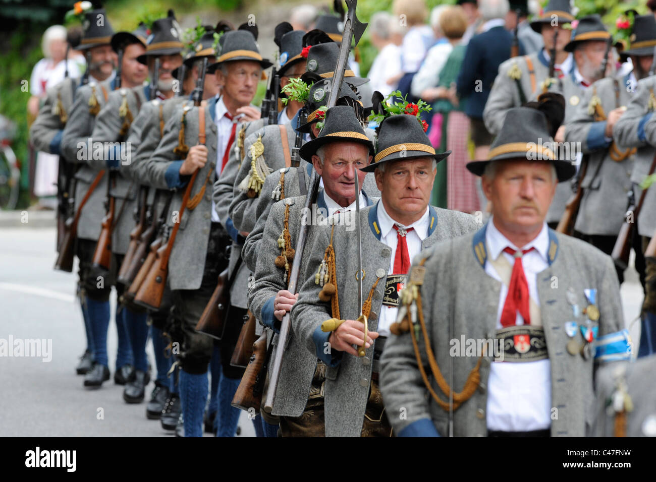 annual public parade of performers in historical costumes and old weapons in commemoration of ancient Bavarian soldiers Stock Photo