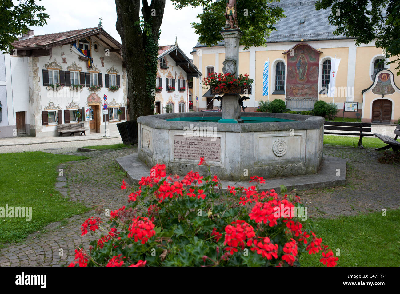 waterspout fountain on market place of city Neubeuern in Bavaria, Germany Stock Photo