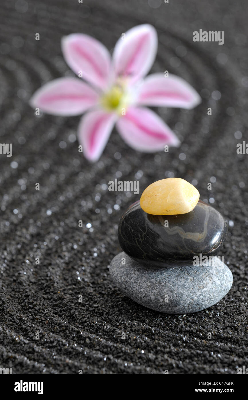 japanese zen garden in sand with stones Stock Photo
