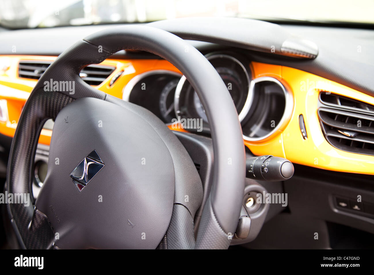 Citroen DS3 car modern loud orange interior steering wheel England UK Stock  Photo - Alamy