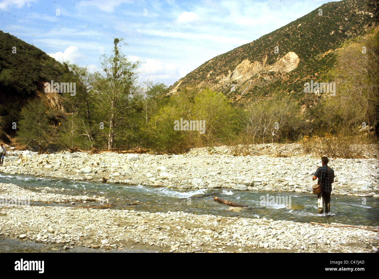 Fishing in the San Gabriel Canyon 1966 1960s fisherman river creek sierra nevada mountains water los angeles county LA southern Stock Photo