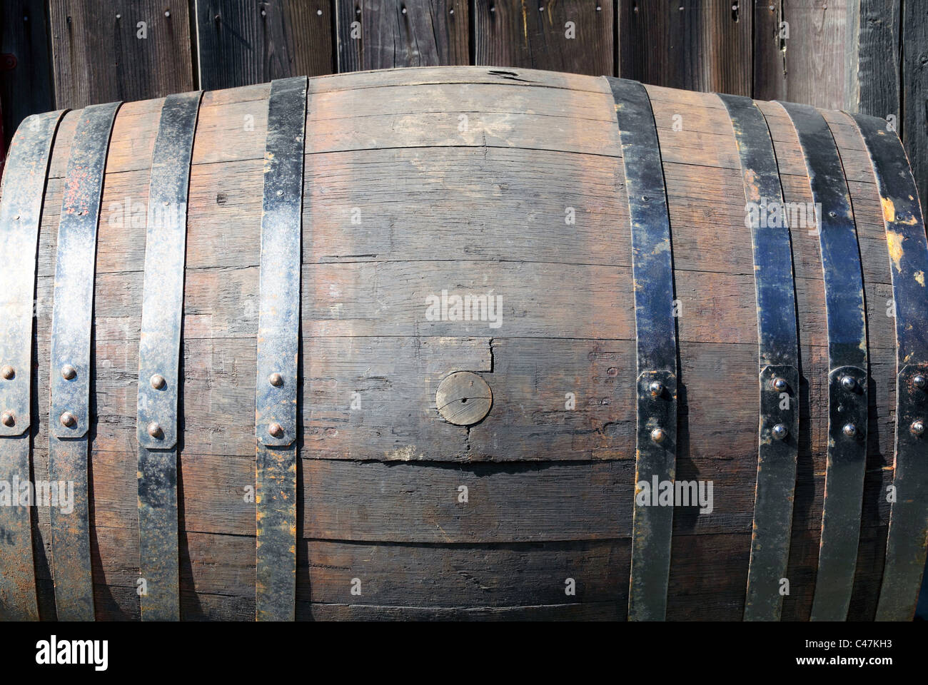 Old wooden barrel cask for alcohol Stock Photo