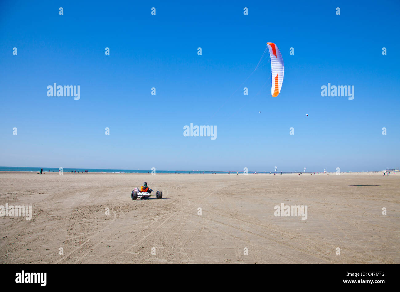 Buggy with kite at beach Stock Photo