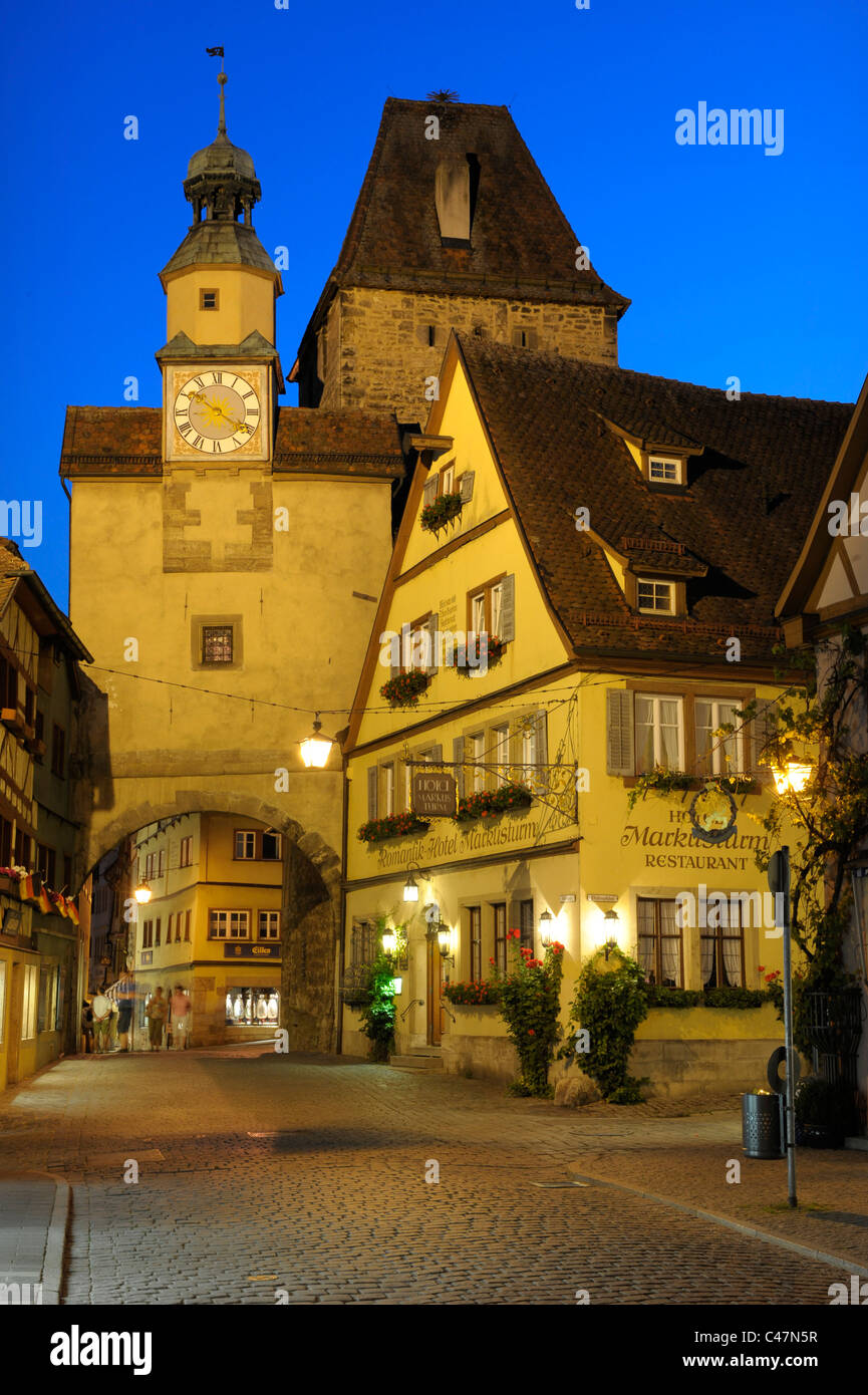 medieval old town Rothenburg ob der Tauber in Germany, Bavaria, with historical buildings at evening Stock Photo