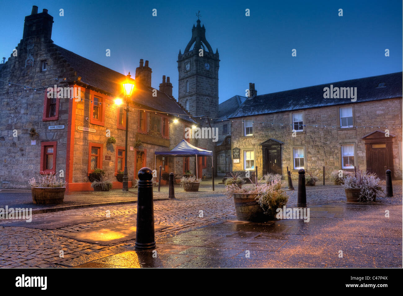 East Kilbride Village showing Montgomery Arms and the Old Parish Church during early dawn Stock Photo