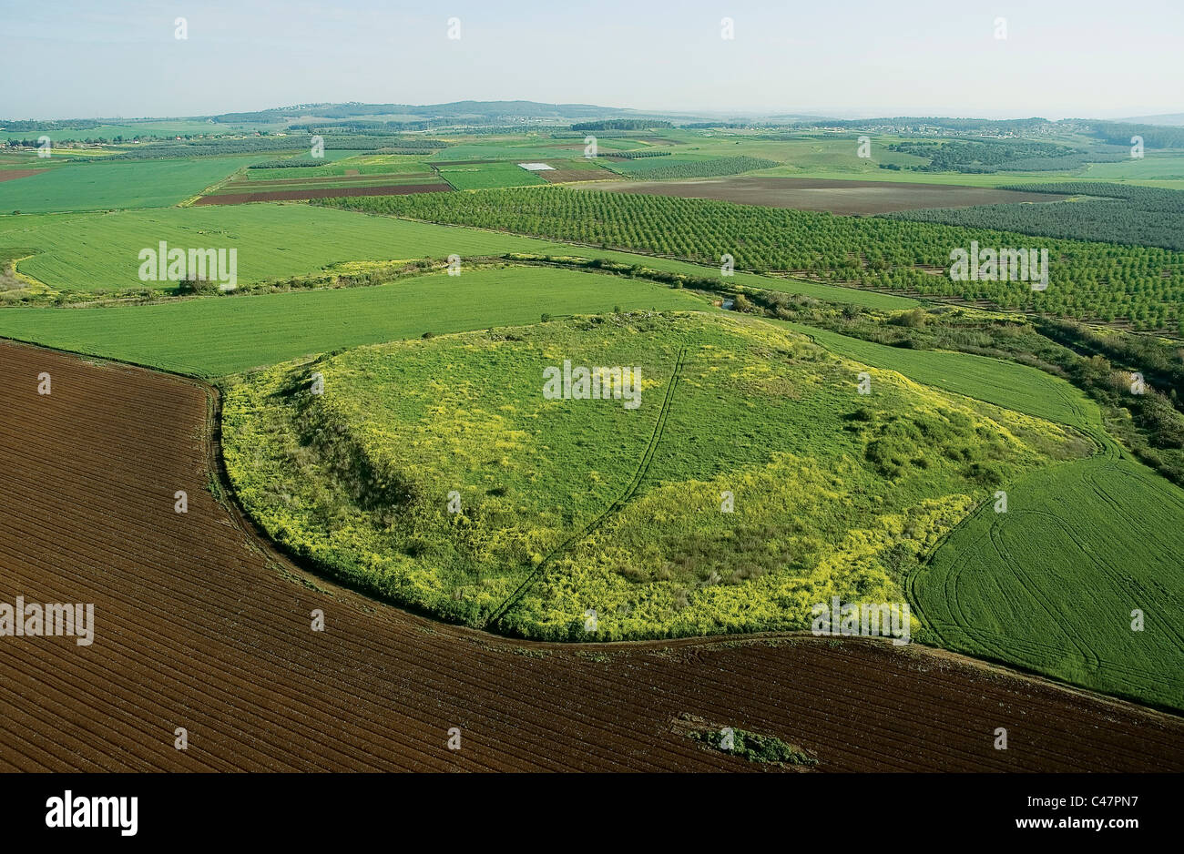 Aerial view of the mound of Batash in the plain Stock Photo