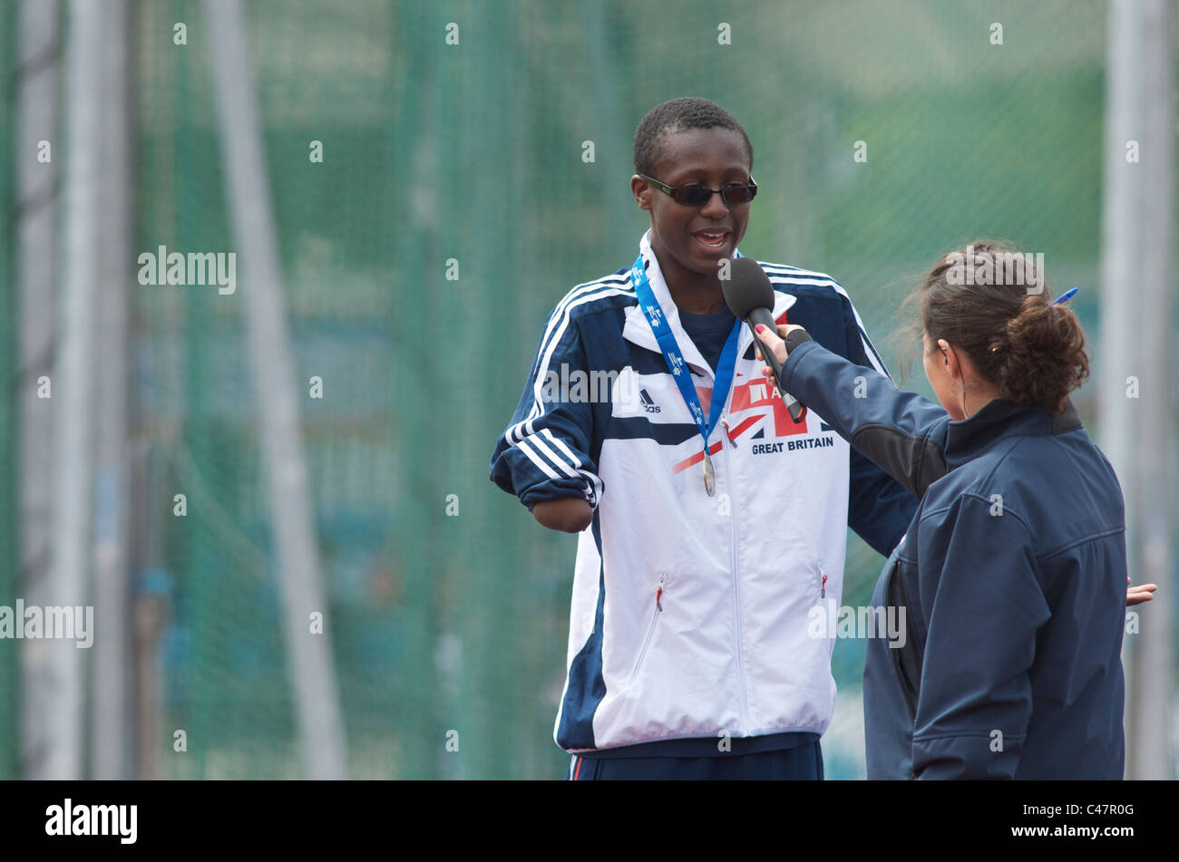 ola abidosun being interviewed after winning at paralympic world cup, manchester, may 2011 Stock Photo