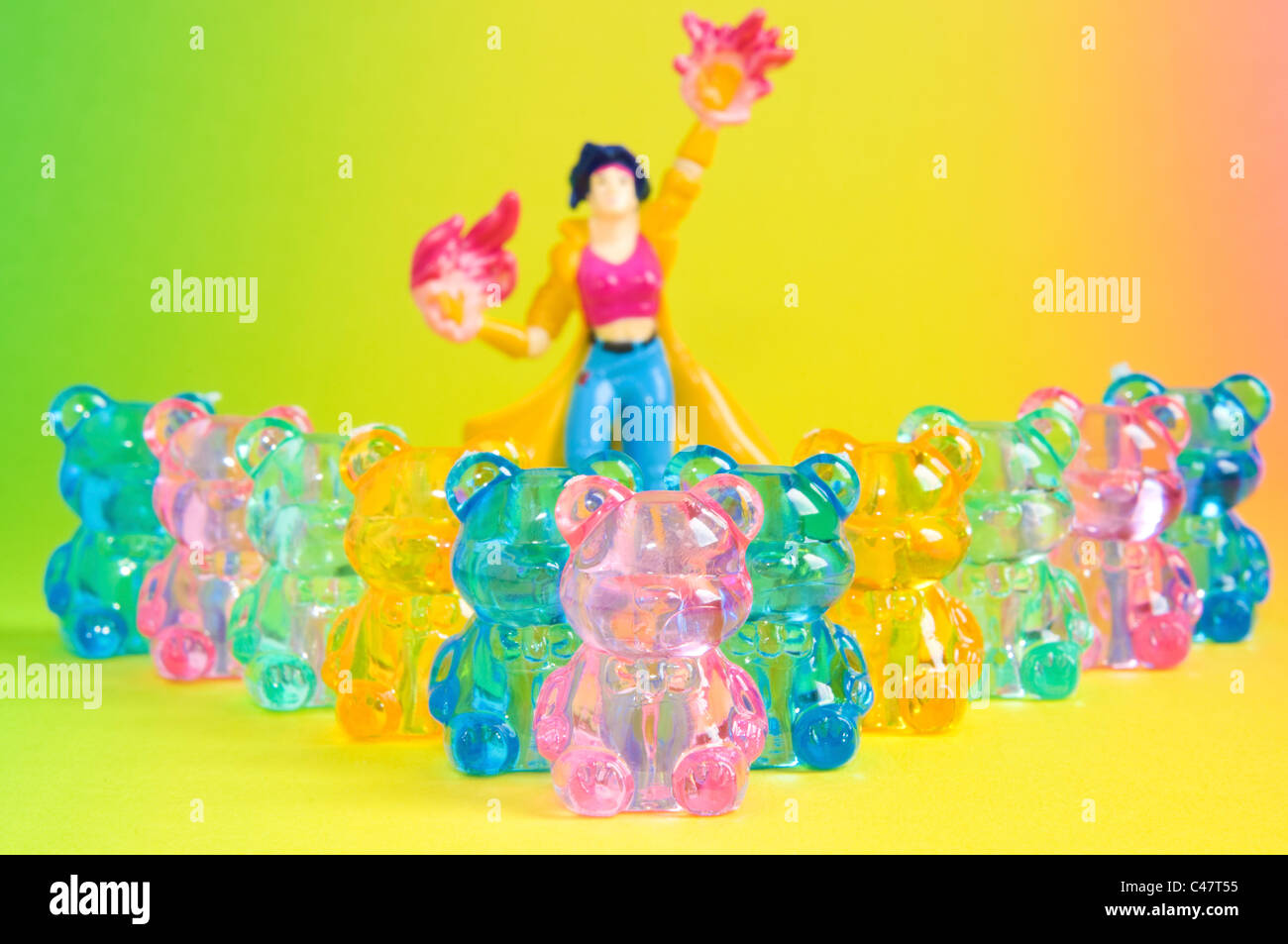 Miniature colorful teddy bears with miniature plastic doll Stock Photo