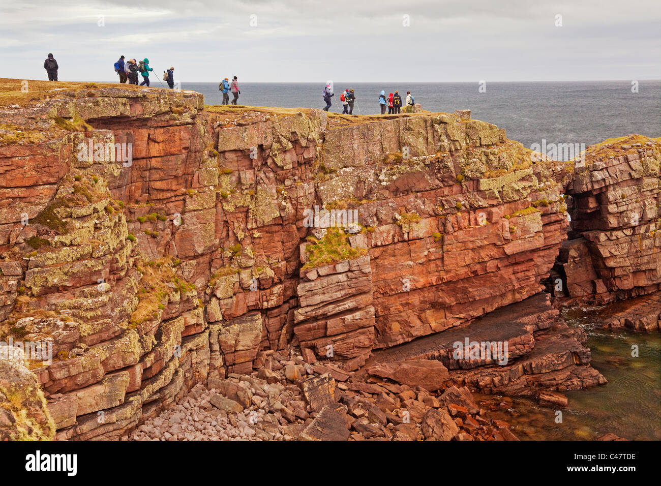 A Rambling Club on a coastal walk between Culkein and Stoer Point Stock Photo