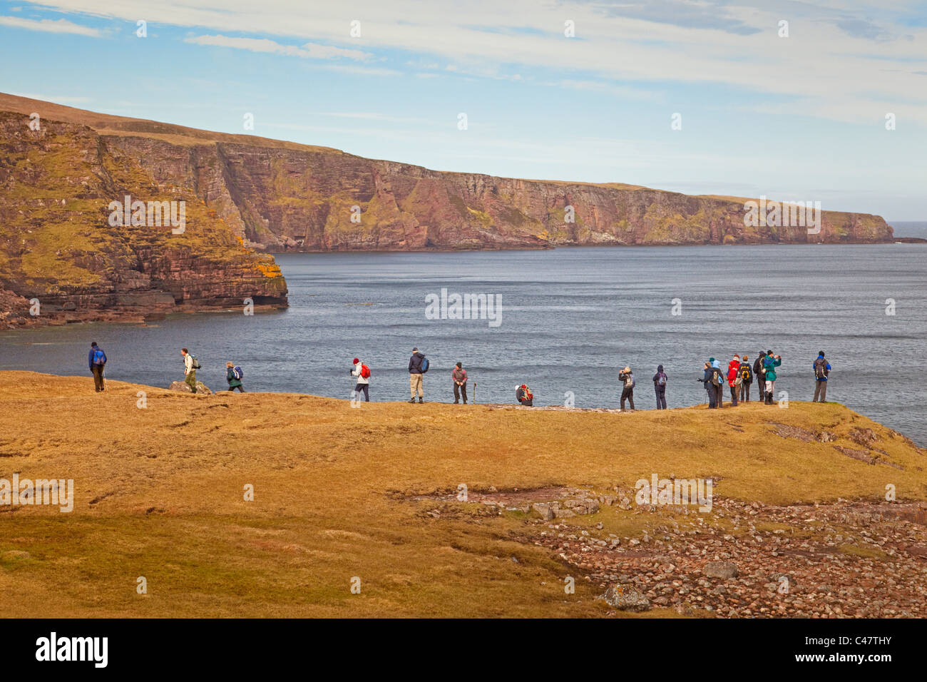 A Rambling Club on a coastal walk between Culkein and Stoer Point Stock Photo