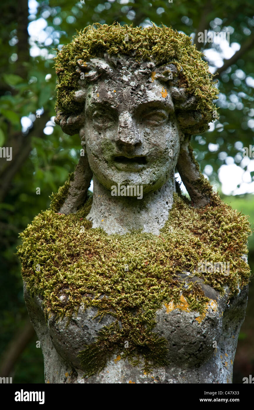 Moss covered statue. UK Stock Photo Alamy
