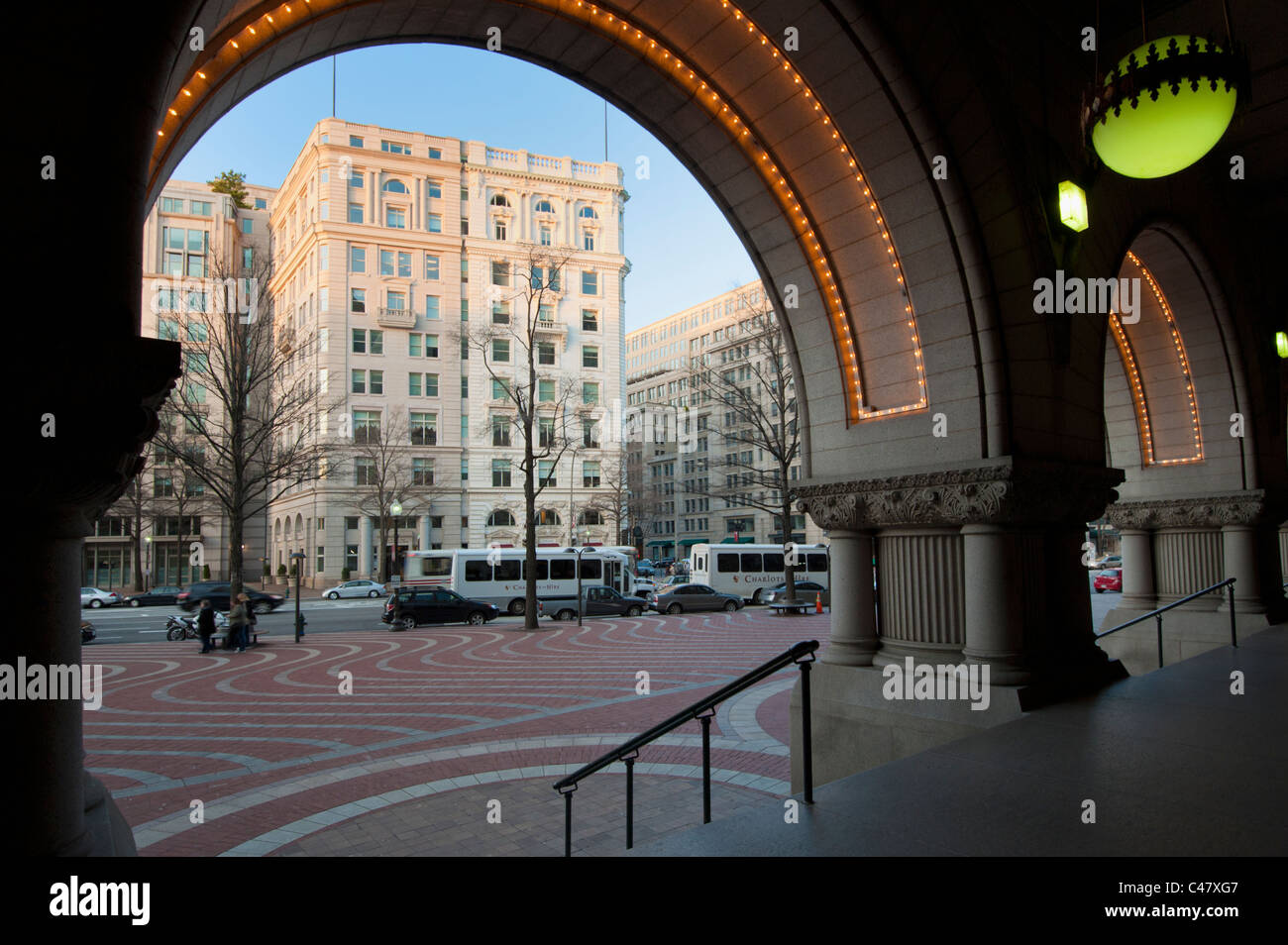 Looking out through the arced entryway of the Old Post Office Pavilion on Pennsylvania Avenue, Washington DC Stock Photo