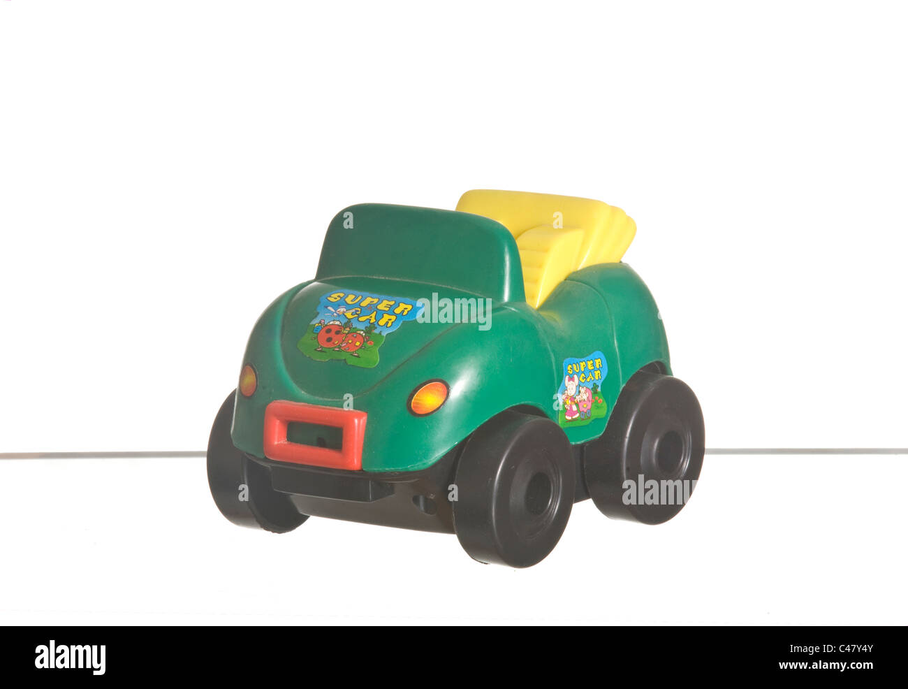 a green toy car, white background Stock Photo Alamy