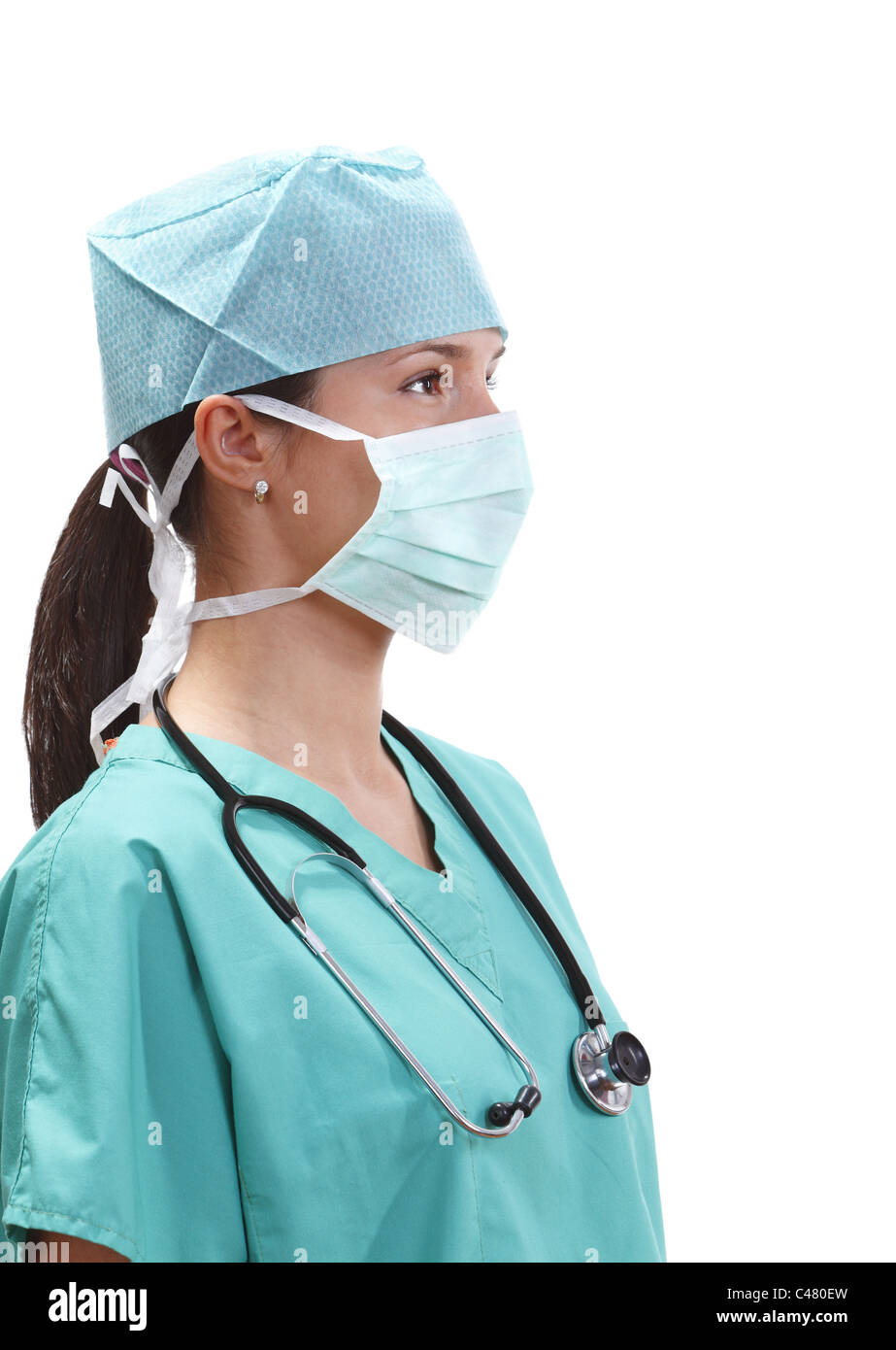 Portrait of a confident female doctor with arms crossed wearing a mask  Stock Photo - Alamy