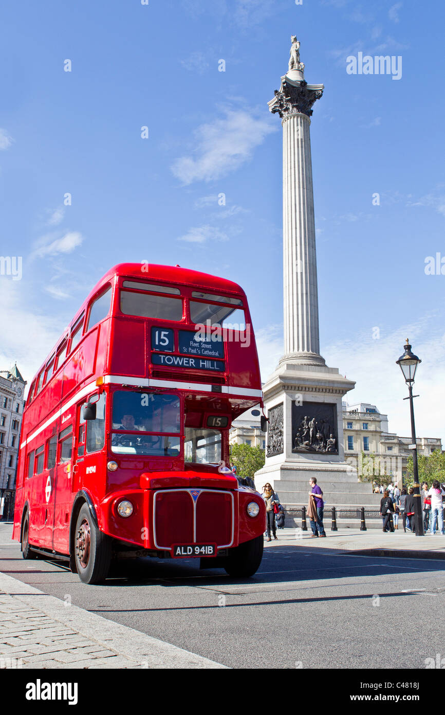 red london bus nelson column trafalgar square Stock Photo