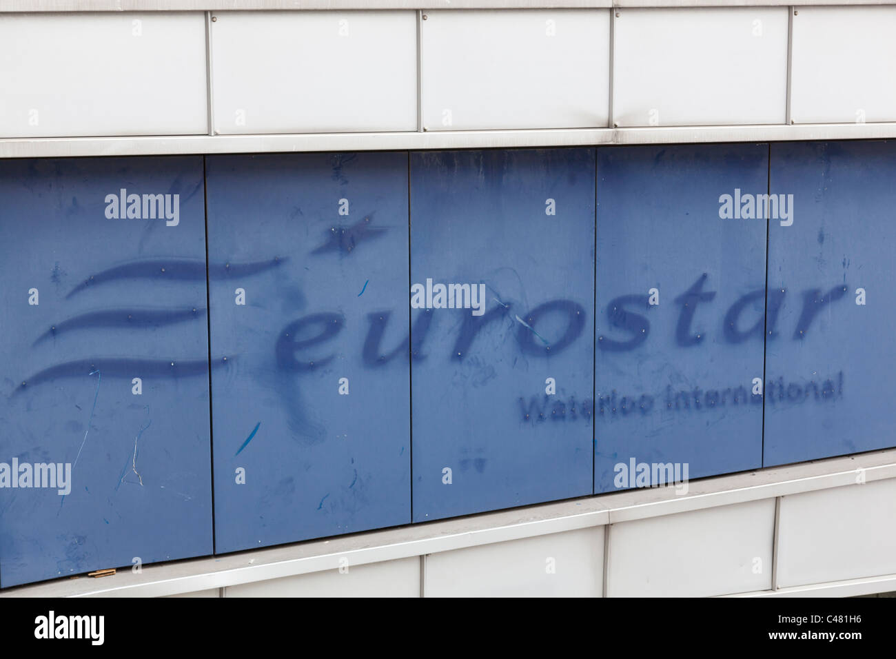 Faded remains of the original Eurostar Waterloo International sign. Stock Photo