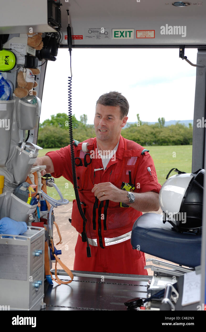 Devon Air Ambulance crew checking kit in Helicopter. Exeter Devon Stock Photo