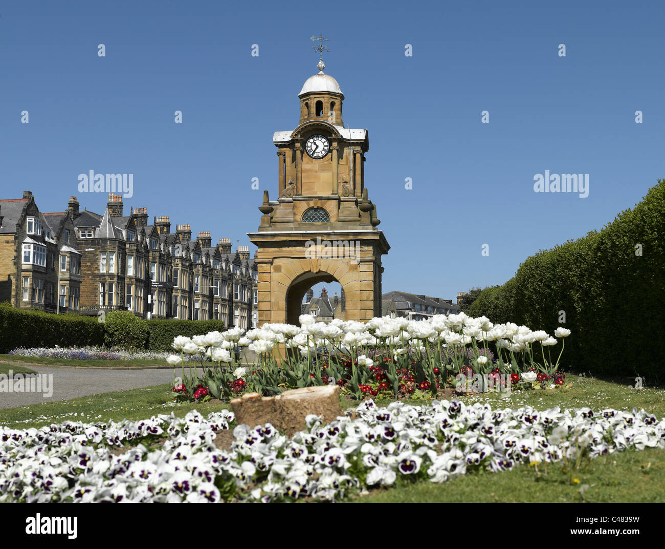 Clock Tower and Shuttleworth Gardens in spring Esplanade South Cliff Scarborough North Yorkshire England UK United Kingdom GB Great Britain Stock Photo