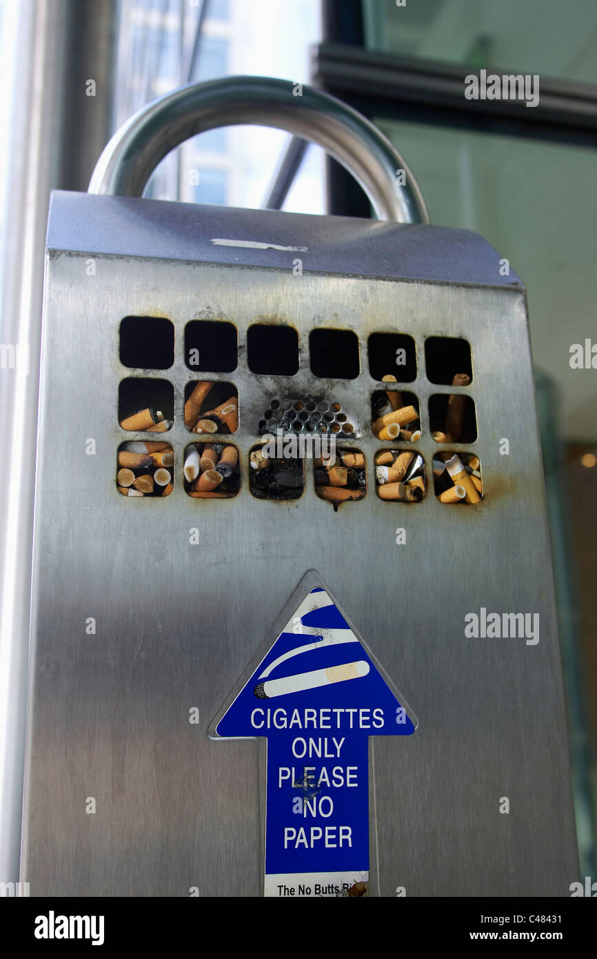 Cigarettes container outside an office building Stock Photo Alamy