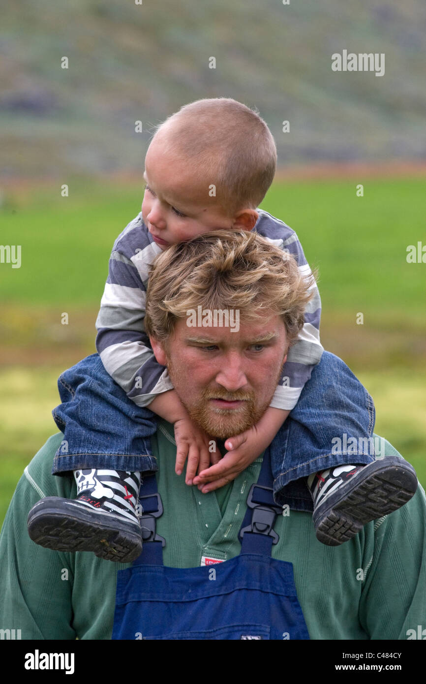 Farmer and son in Illorsuit, Greenland Stock Photo Alamy
