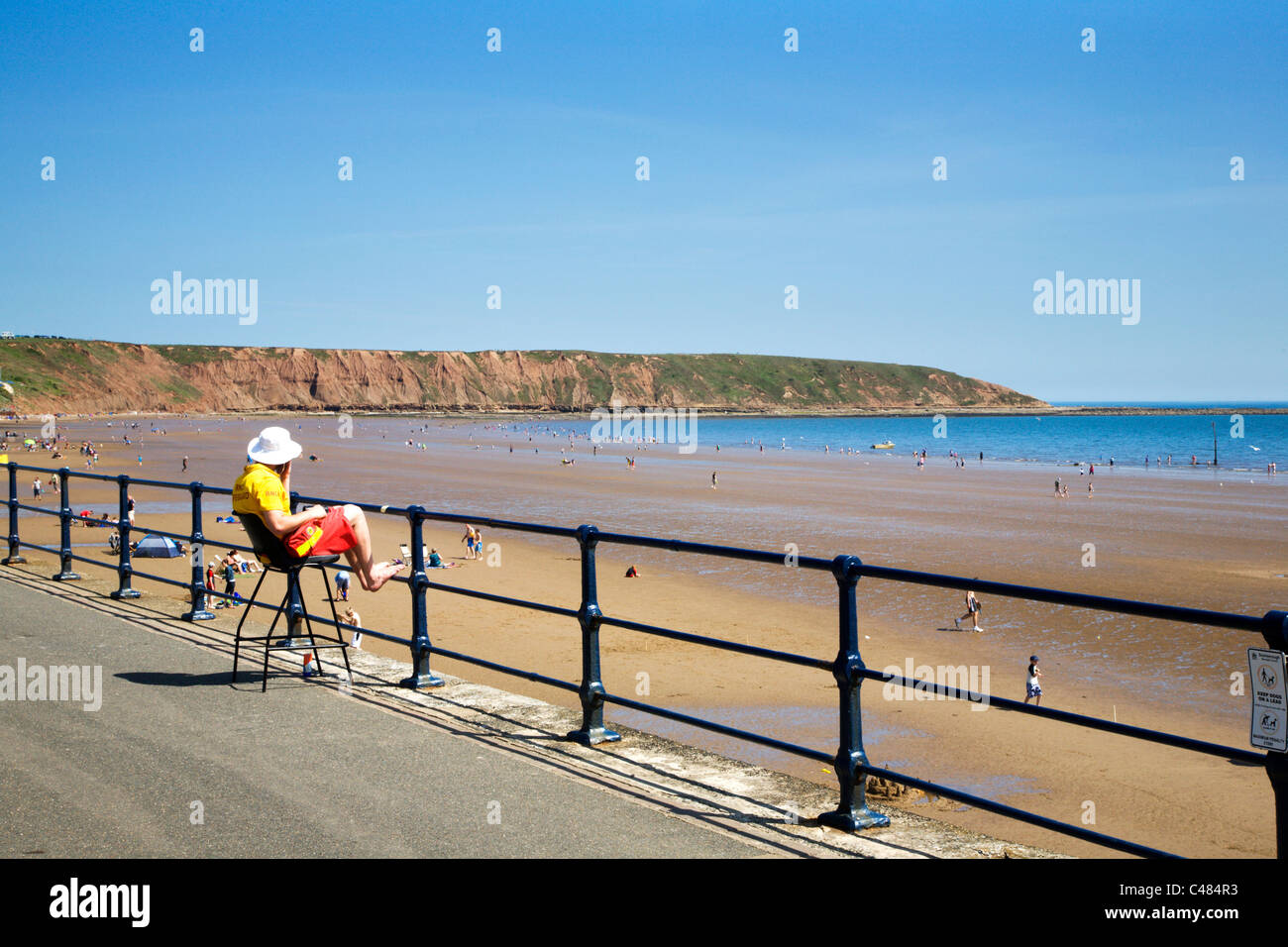 RNLI Lifeguard On Duty Filey North Yorkshire England Stock Photo Alamy
