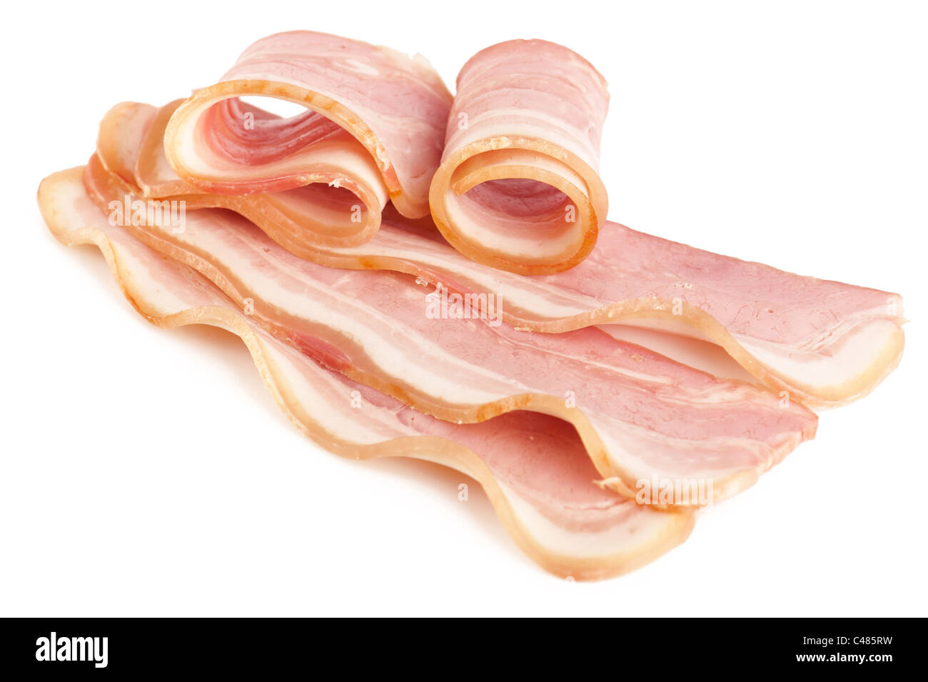 Tasty sliced pork bacon isolated on white background Stock Photo