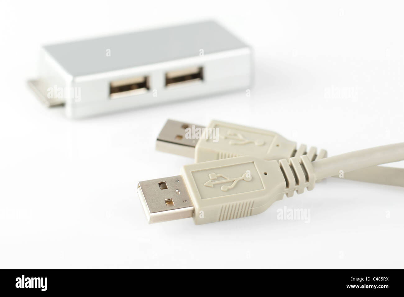 Universal serial bus connection cable and adapter. Shallow depth of