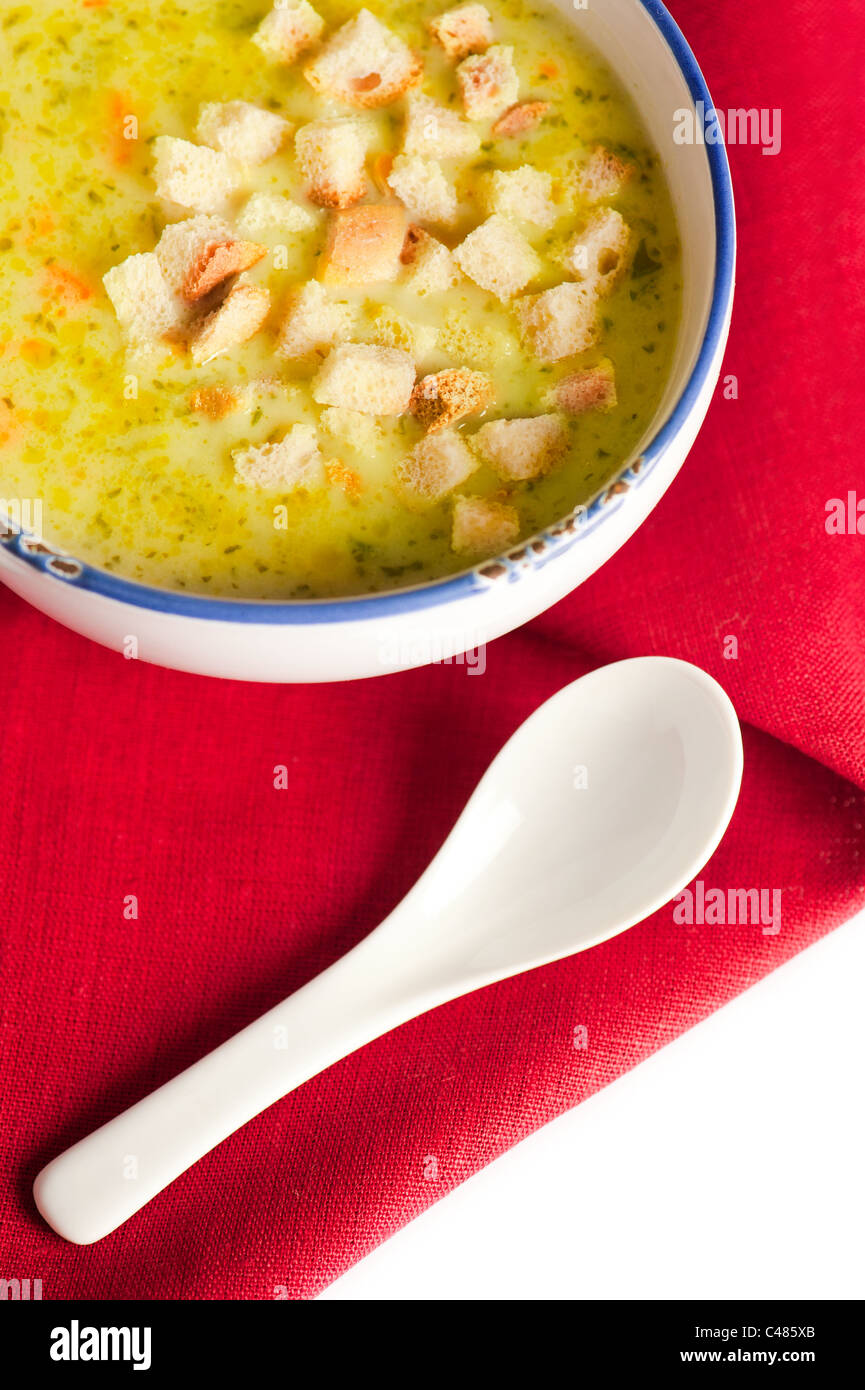 Delicious vegetable soup with carrot and croutons Stock Photo