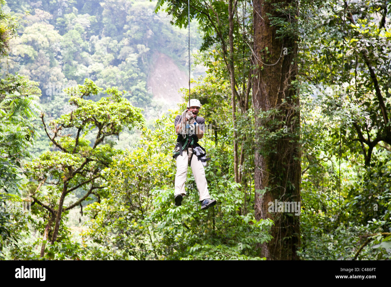 So called Tarzan Swing, Extremo Monteverde Canopy Tour, Monteverde Costa Rica Stock Photo