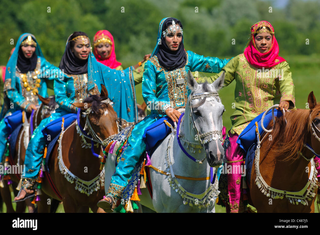 arabian Royal Cavalry of Oman in original costume on arabic horse while a public show