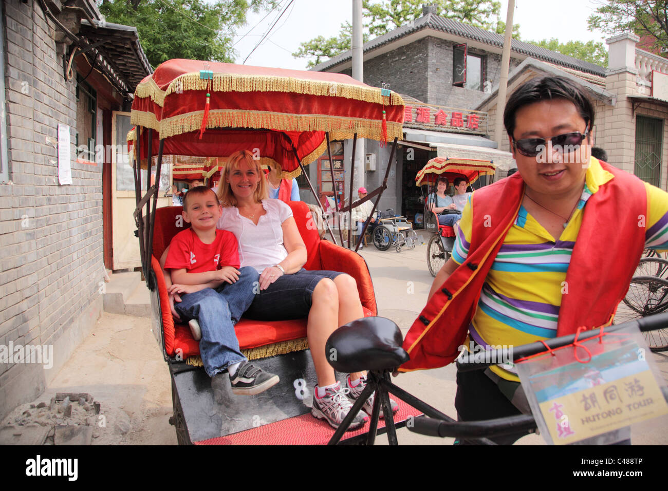 Rickshaw ride, Beijing China Stock Photo