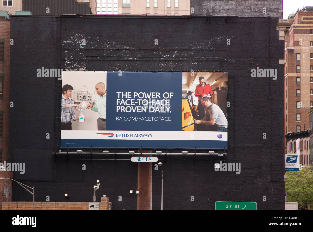 Billboard promoting face-to-face interaction among people. Stock Photo