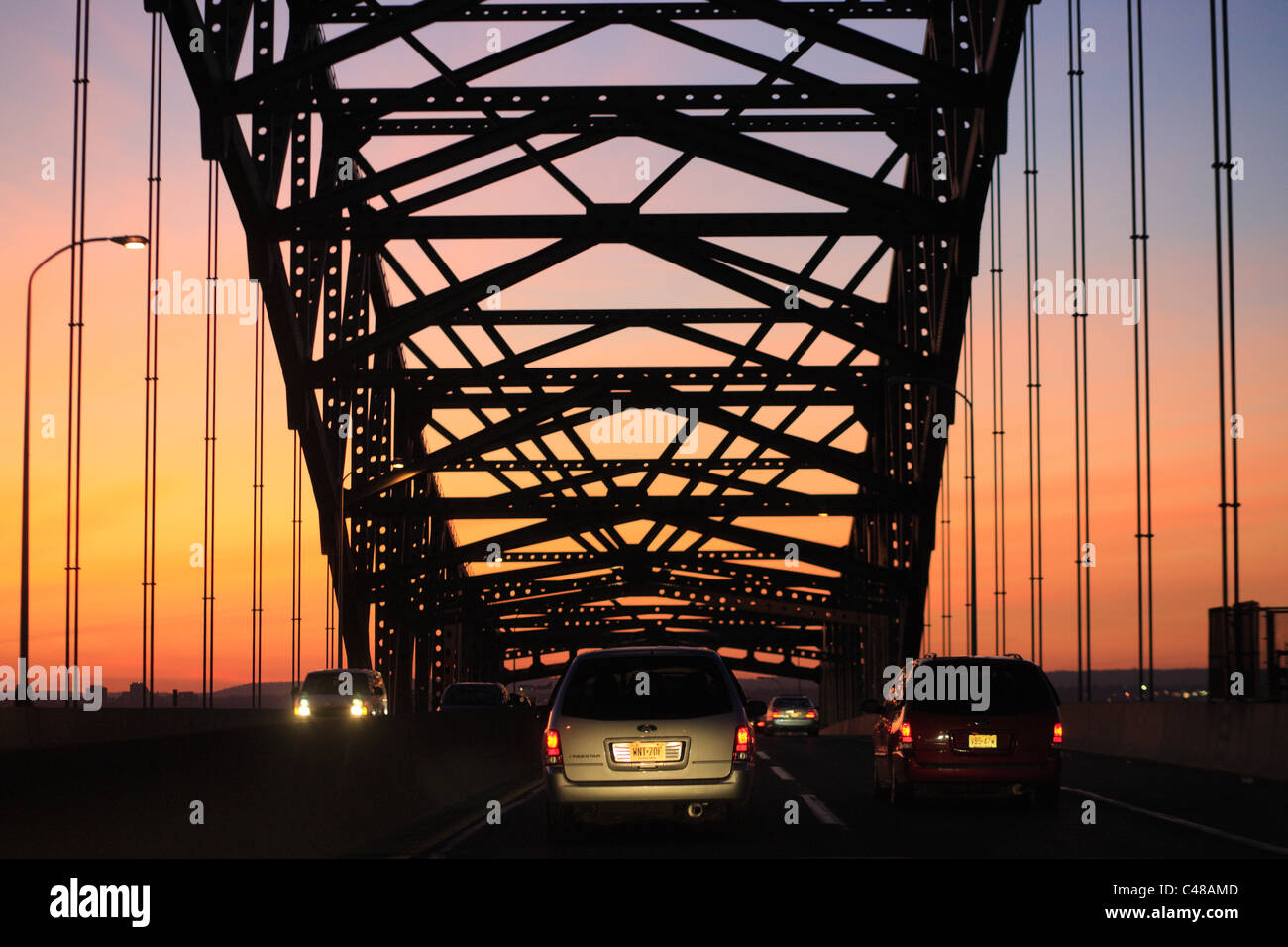 A bridge and a highway at sunset, Jersey City, USA Stock Photo