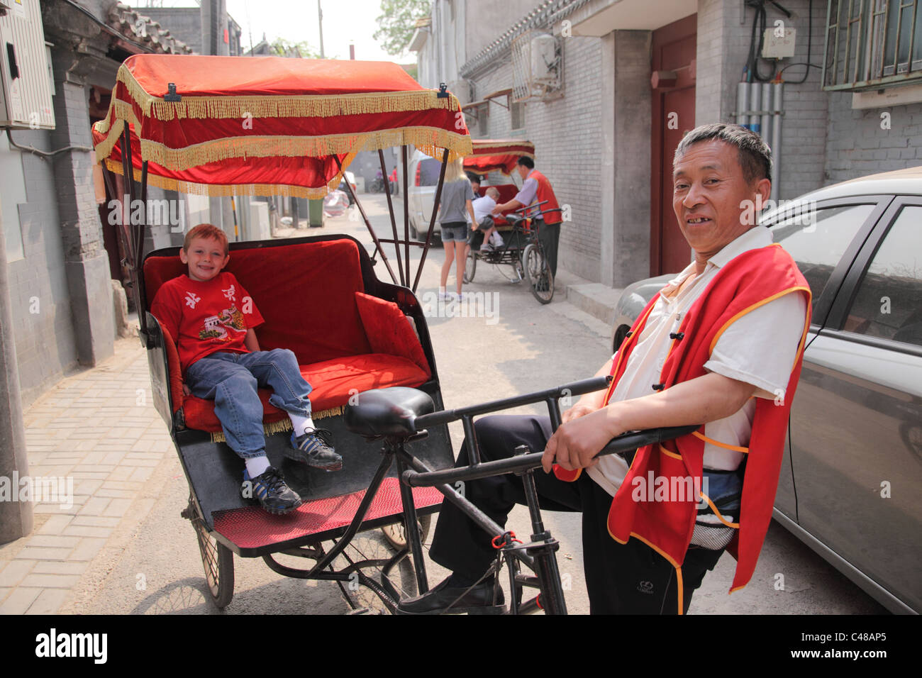 Richshaw ride, Beijing China Stock Photo