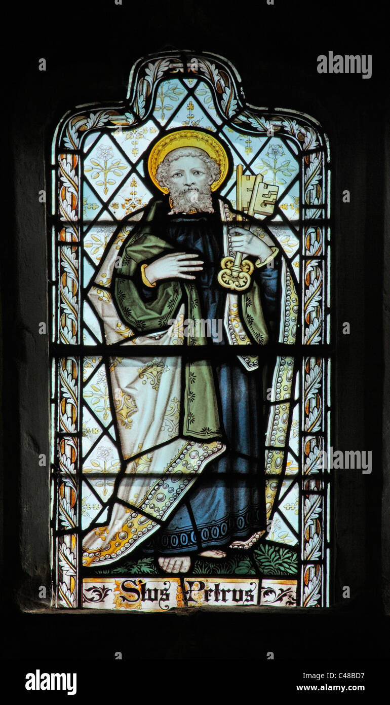 A stained glass window by The Kempe Studios depicting St Peter, Church of St Peter and St Paul, Steeple Aston, Oxfordshire Stock Photo
