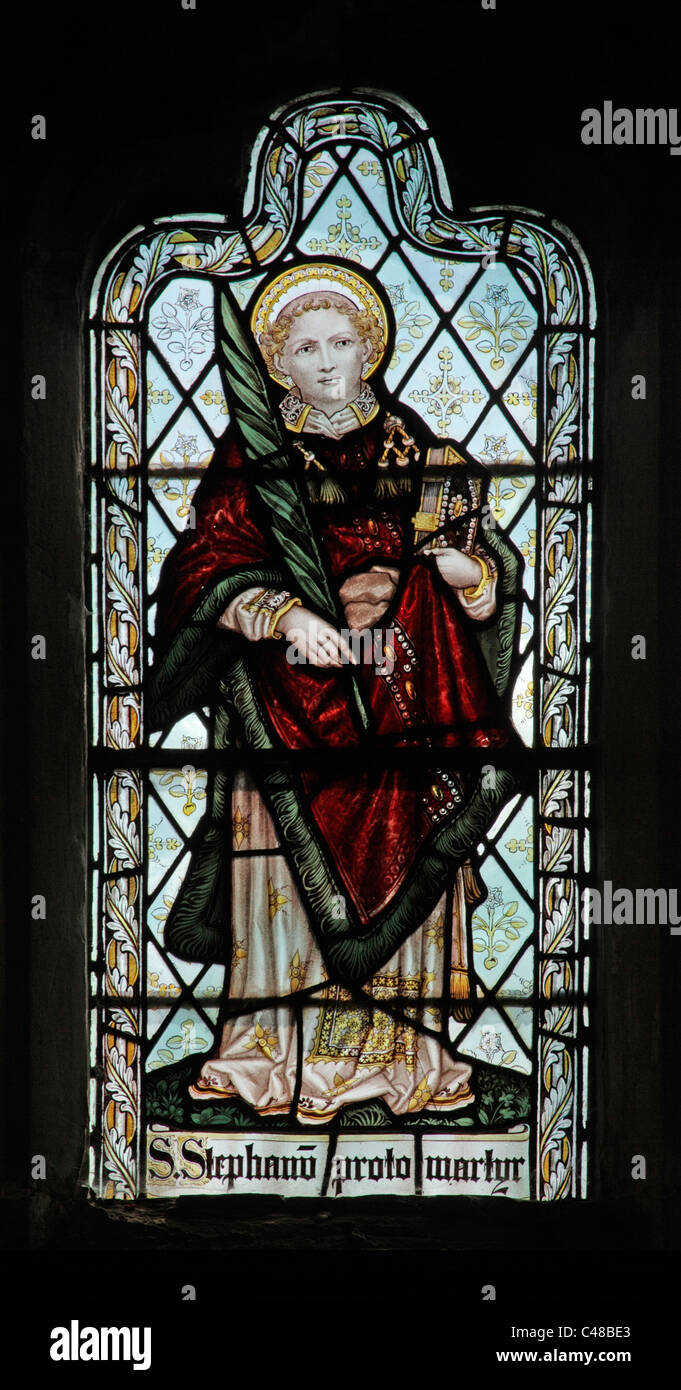 A stained glass window by The Kempe Studios depicting St Stephen, Church of St Peter and St Paul, Steeple Aston, Oxfordshire Stock Photo