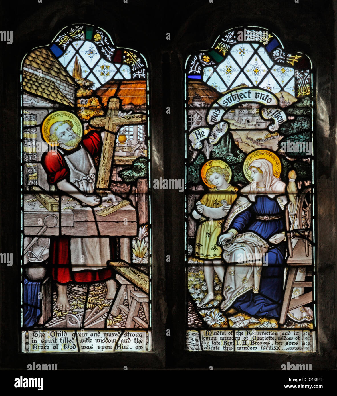 A stained glass window by The Kempe Studios depicting Jesus, Mary