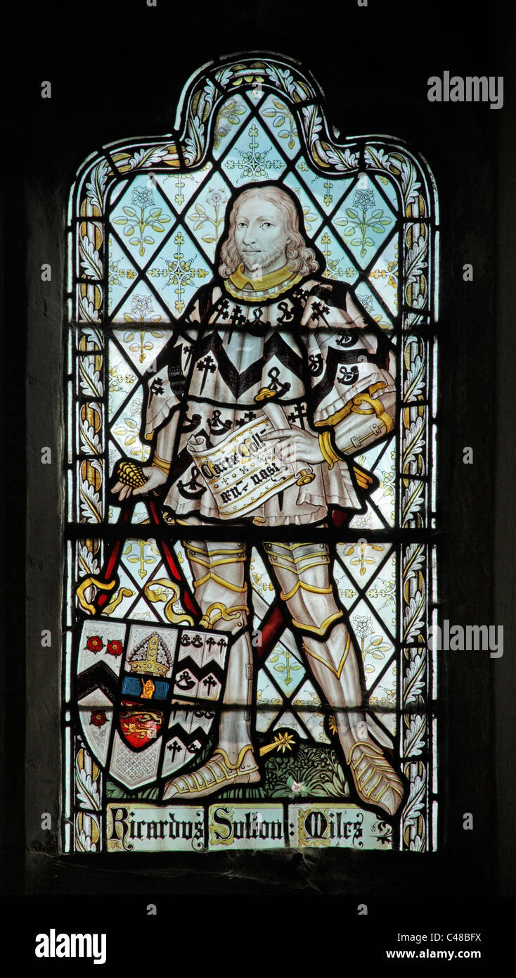A stained glass window by The Kempe Studios depicting Sir Richard Sutton, founder of Brazenose College, Oxford Stock Photo