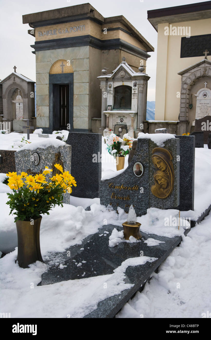 Graves and vaults.Winter. Pigra cemetery. Lake Como. Lombardy. Italy. Stock Photo