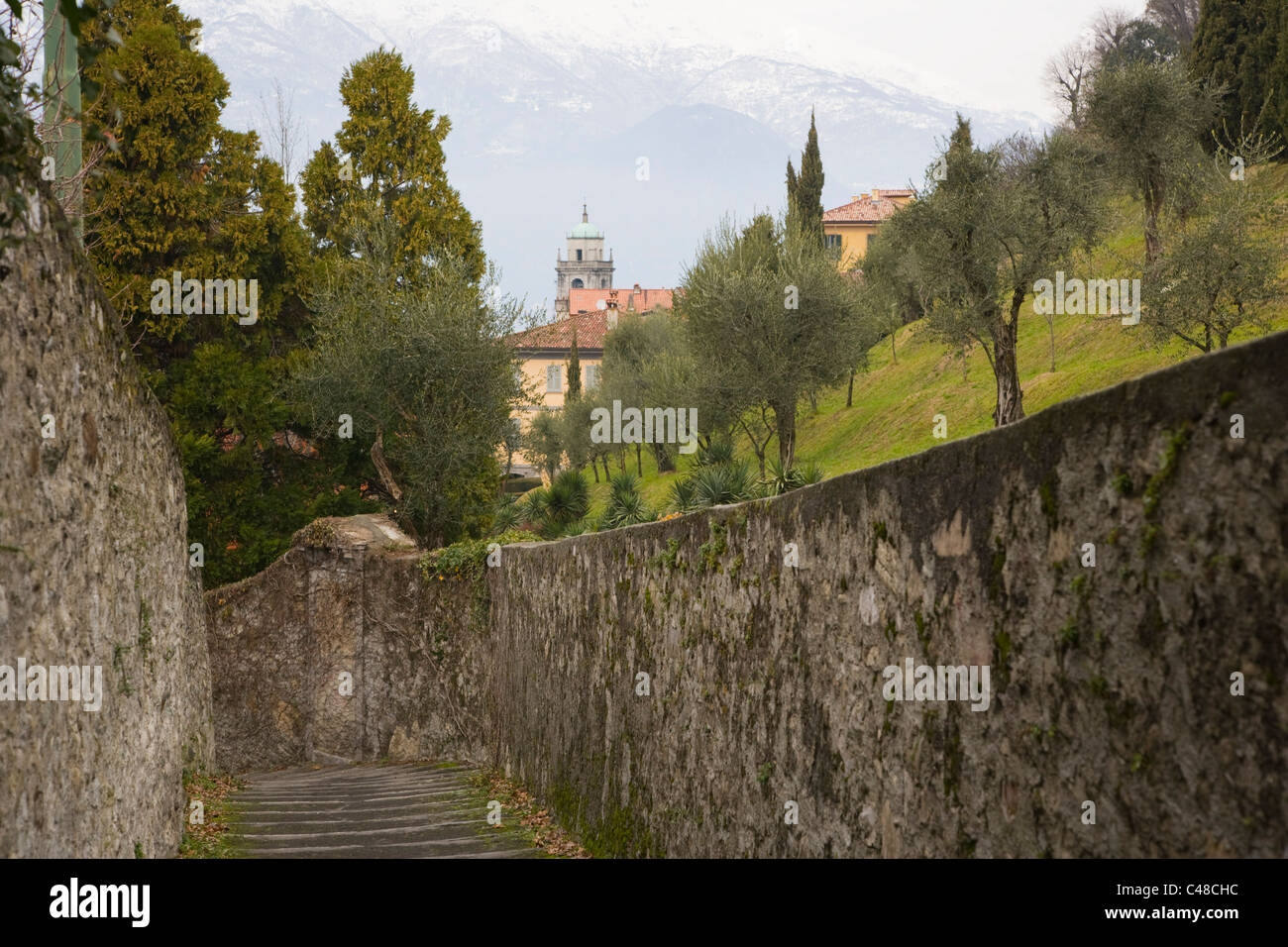 View on St. Giacomo Church, Basilica di San Giacomo, from Salita Cappuccini street at Bellagio on Lake Como. Lombardy. Italy. Stock Photo