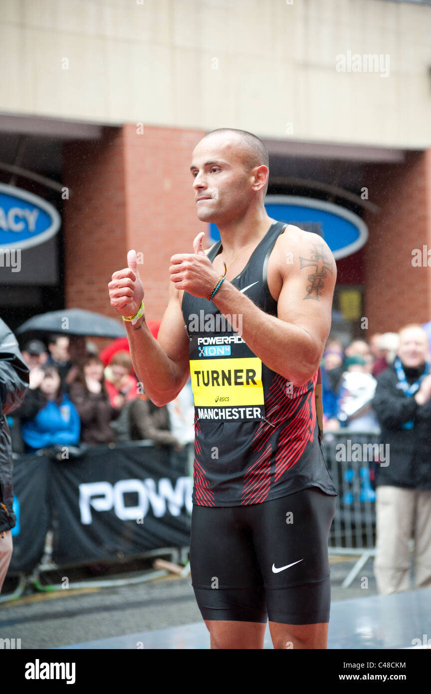 Andy Turner posing for the cameras at the Great City Games in Manchester on 15th May 2011. Stock Photo