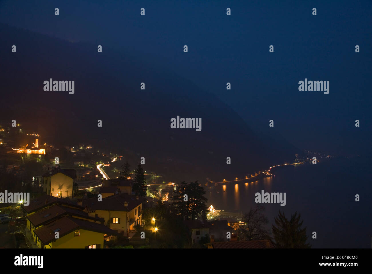 Twilight Argegno and lake from Via Schignano at Argegno on Lake Como. Lombardy. Italy. Stock Photo