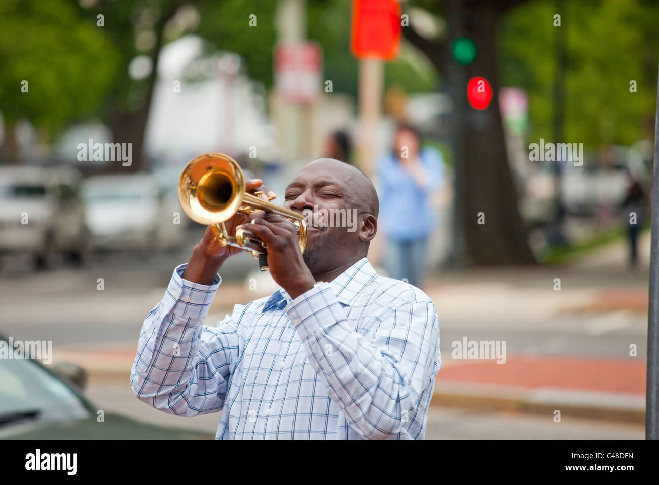 Freddie Dunn playing trumpet, street musician in Washington DC Stock ...