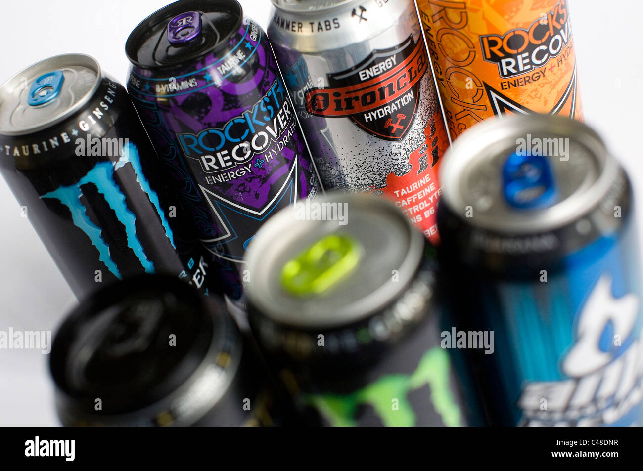 A mix os RockStar, Monster, AMP and Red Bull energy drinks.  Stock Photo