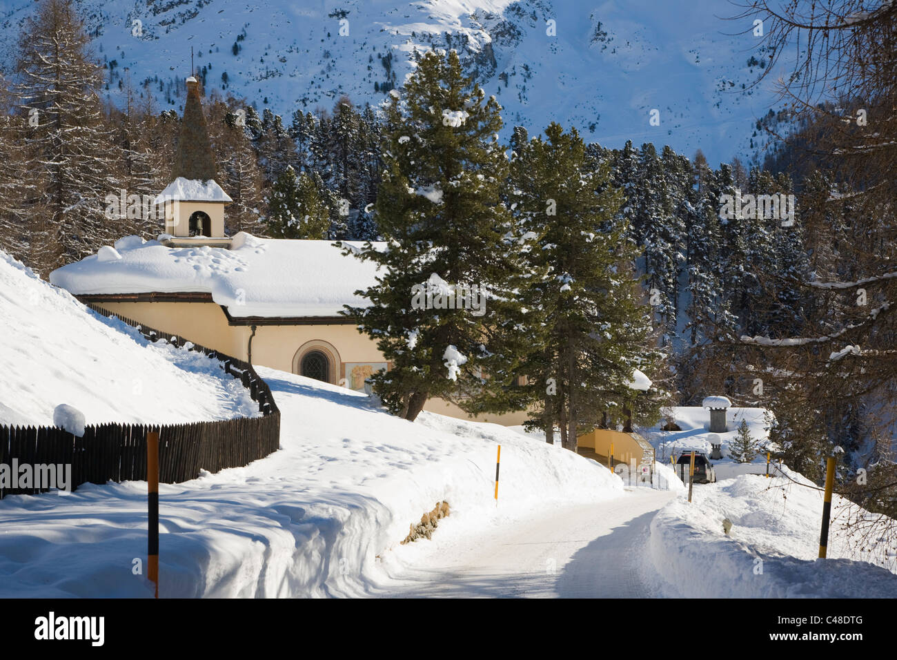 Church near Suvretta House. St.Moritz. Graubunden, Grisons mountains. Alps. Switzerland. Winter. Stock Photo