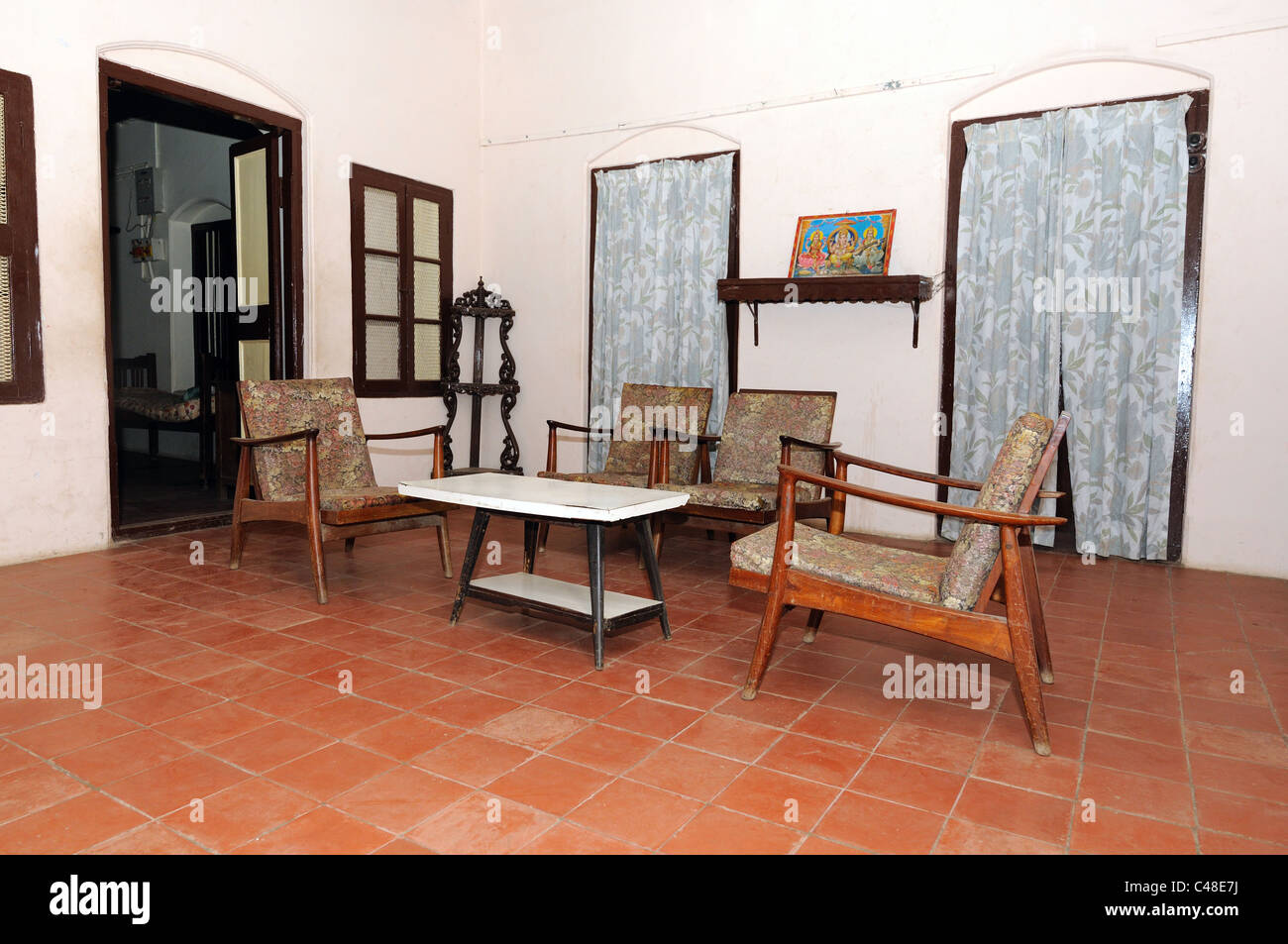 An old traditional indian house with furniture on display Stock ...
