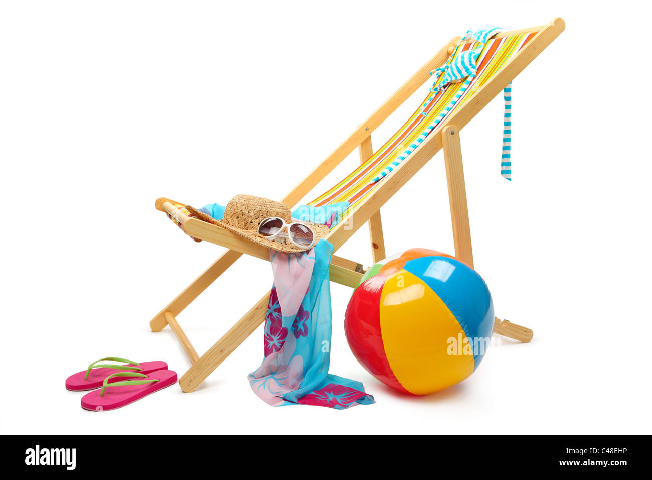 Beach chair and accessories isolated on white background. Stock Photo