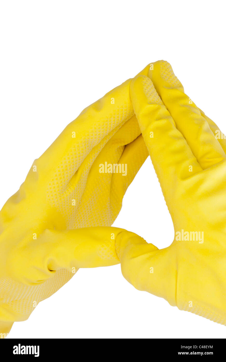 Hands in rubber yellow gloves Stock Photo - Alamy