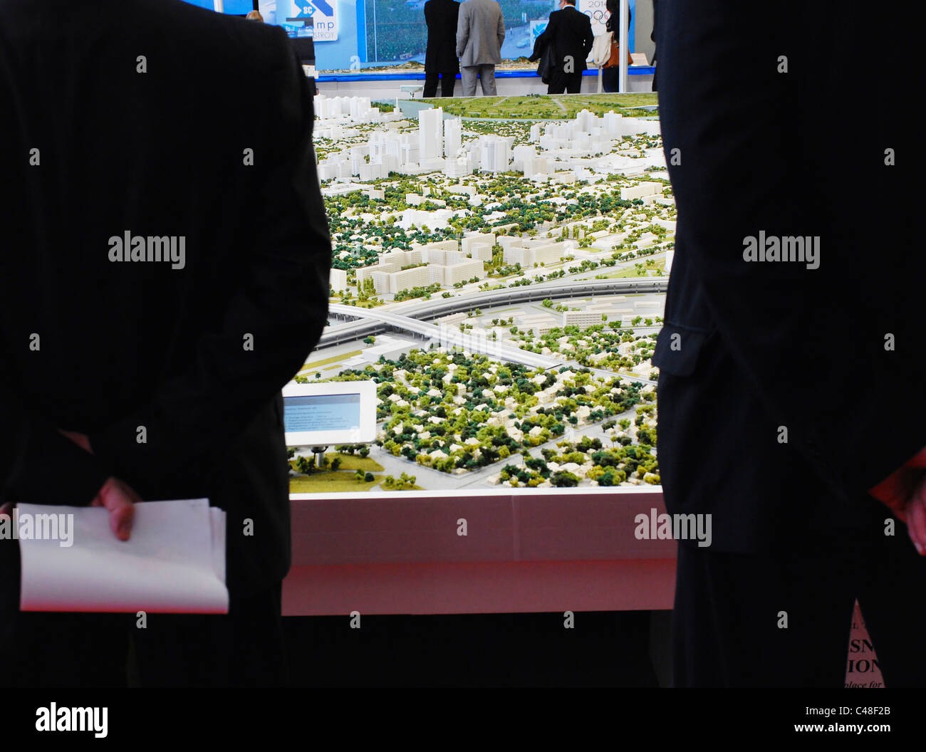 FRANCE CANNES. 10th March 2009. MIPIM the world's biggest property fair. Investors look at model of Krasnoder region Russia Stock Photo